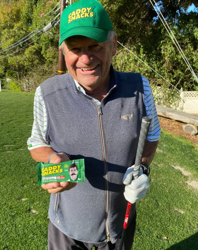 Vito holding Caddy snack